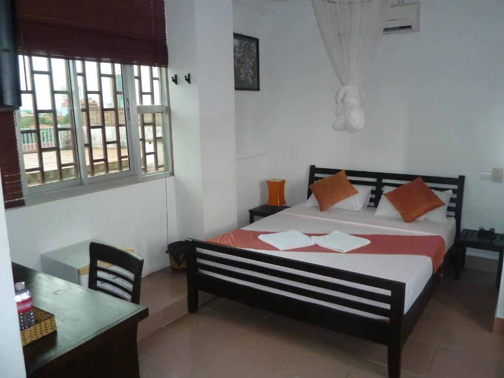 Cyclo Hotel-Bar-Restaurant Phnom Penh Phòng bức ảnh